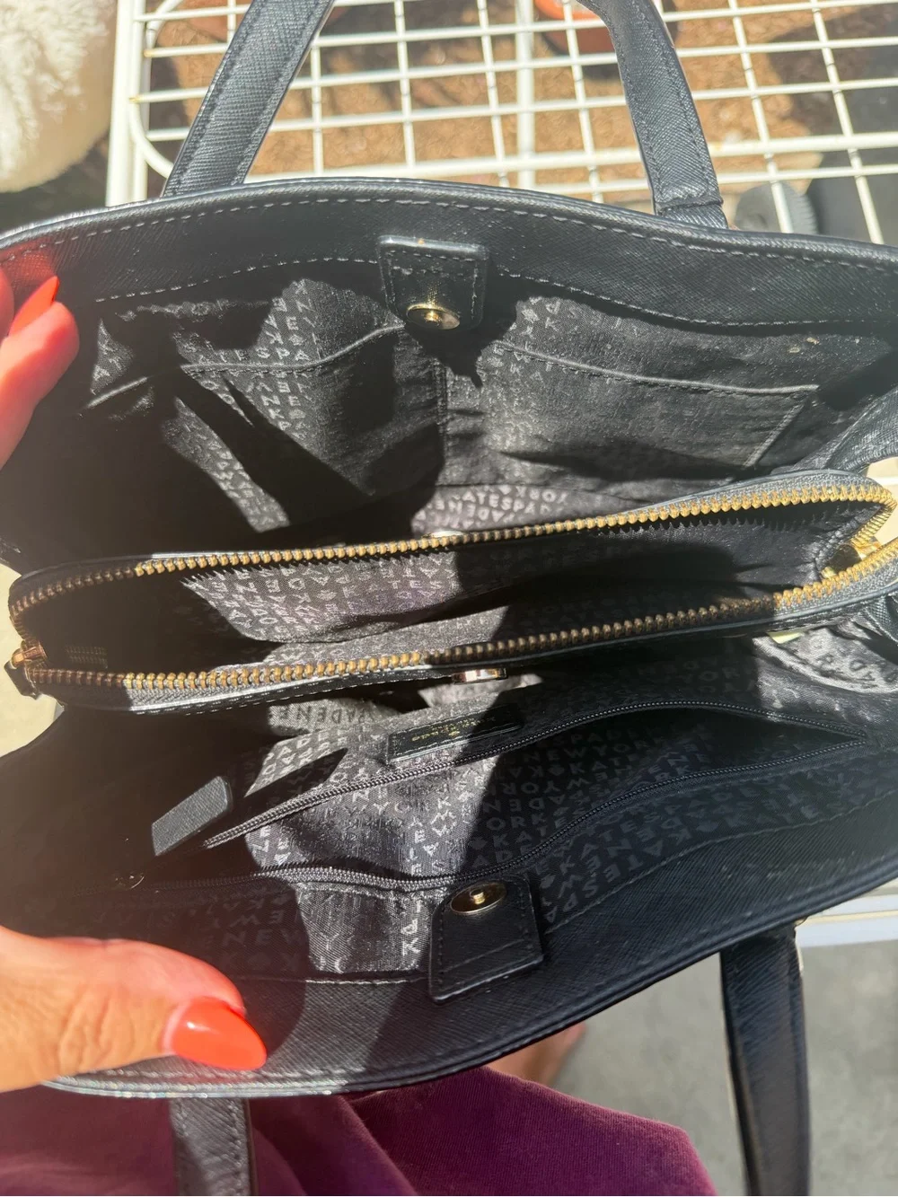 kate spade black Saffiano satchel with gold-tone logo